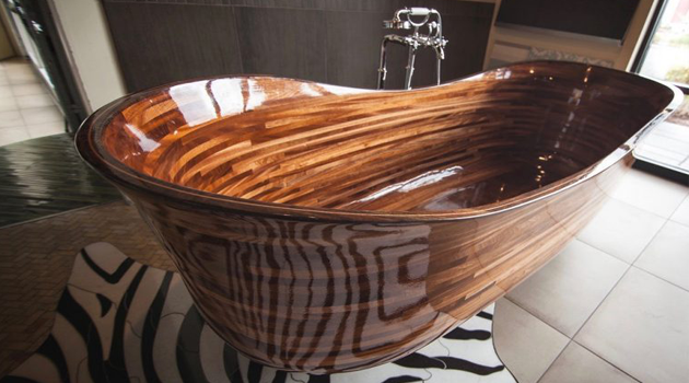 former boat builder sculpts breathtaking wooden bathtubs